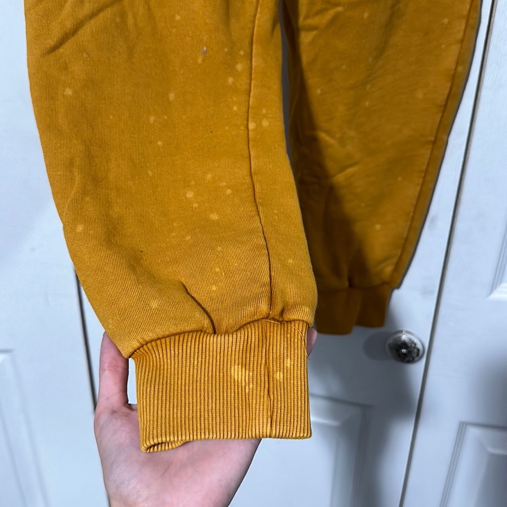 Mustard Urban Outfitters Puffy Pants with light bleach spots. - Picture 5 of 9